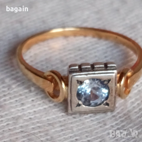 Сребърен пръстен с аквамарин и позлата.