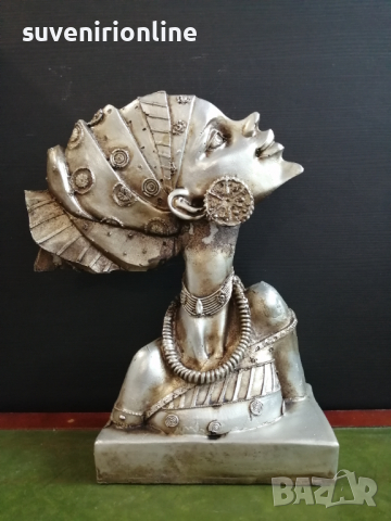 Декоративна статуетка африканка