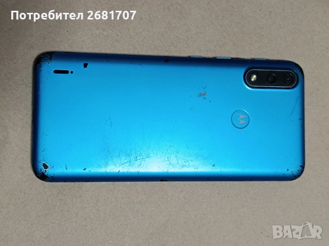 телефон Моторола Е 7 