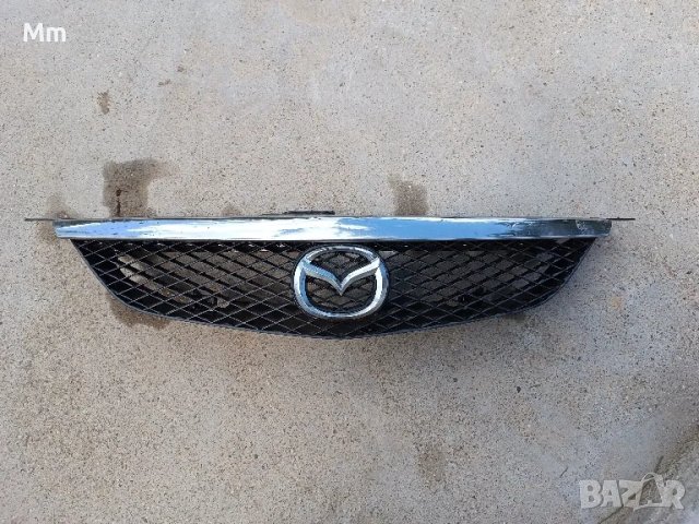 решетка мазда 323