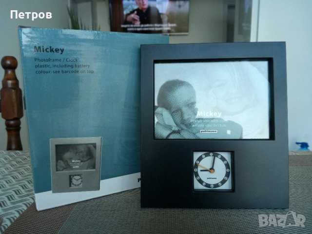 Продавам интересен часовник,с рамка над него за вашата любима снимка.Нов.Кварц.