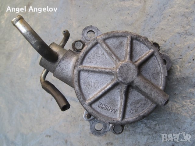 Вакуум помпа X2T58171A RF4F18G00 за  MAZDA PREMACY MAZDA 323 VI (BJ) 2.0 TD 101 к.с., снимка 1