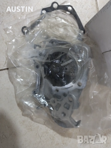 Водна помпа Дачия Сандеро банзин1,4, снимка 3 - Части - 53629949