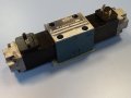 Хидравличен разпределител BOSCH 0810 090100 directional control valve 24VDC, снимка 1 - Резервни части за машини - 42222306