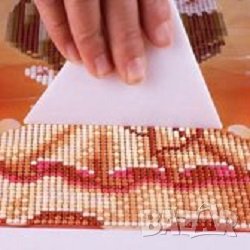 Уред за фиксиране на диамантен облен