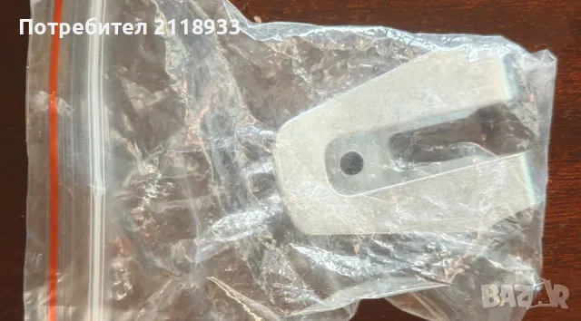 кука за закачване на колана на винтоверт. 