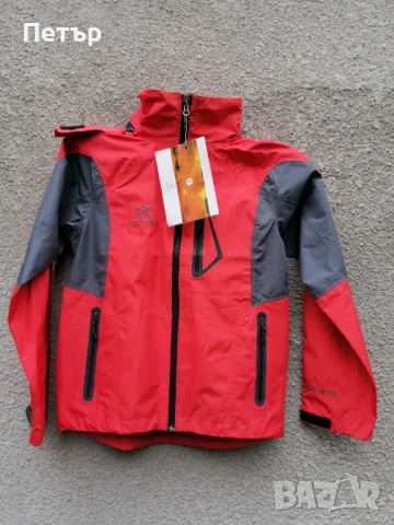 Продавам чисто ново дамско оранжево водоустойчиво и ветроустойчиво яке Arc'teryx с лепени шевов