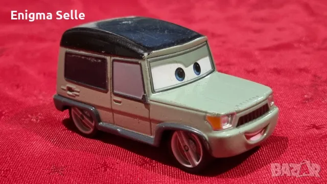 Метална колекционерска кола Disney Store CARS 2 MILES AXLEROD 1:43, снимка 4 - Колекции - 50010536