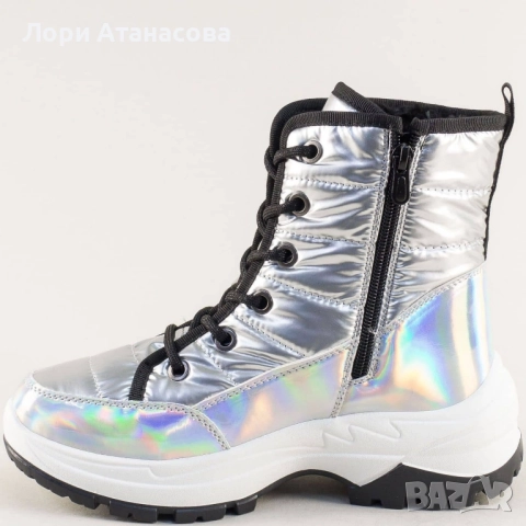 Дамски зимни апрески в сребрист преливащ цвят.