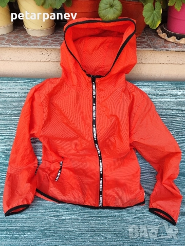 Женска оранжева ветровка Ho2 - L размер