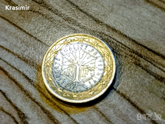 Рядка колекционерска монета 1 евро 2001 г. Дърво на живота и надпис "LIBERTÉ ÉGALITÉ FRATERNITÉ"