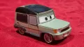 Метална колекционерска кола Disney Store CARS 2 MILES AXLEROD 1:43, снимка 4