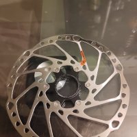 Чист нов ротор Shimano DEORE SM-RT64 CL 203mm

, снимка 1 - Части за велосипеди - 44261795