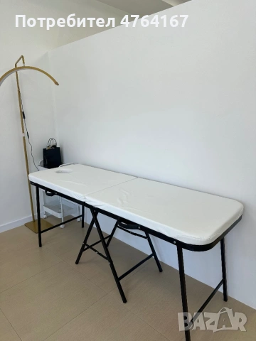 Масажна кушетка