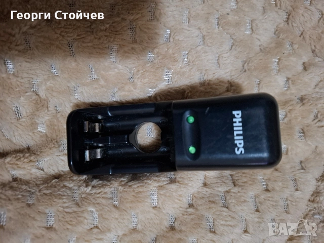 Продавам машинка за зареждане на батерии PHILIPS 