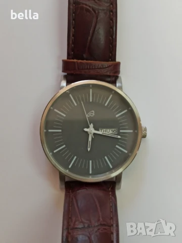 Мъжки стилен часовник AURIOL ,батерия в запазен вид ,работещ