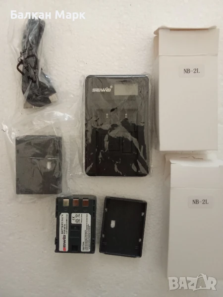 Универсално зарядно SEIWEI® + 2 батерии NB-2L (7.4V, 1200mAh, Li-ion) –за Canon, снимка 1