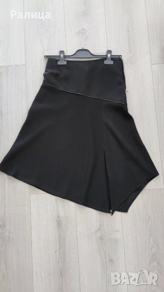 Черна дамска пола, с цепка отпред, размер XS, снимка 1