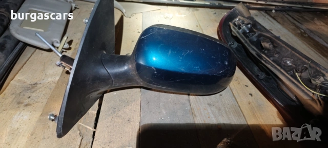 Огледало ляво ръчно Opel Corsa C, снимка 2 - Части - 53304065