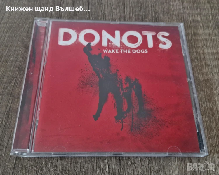 Компакт Дискове - Рок Метъл:  Donots - Wake the dogs, снимка 1