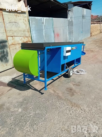 Машина за чистене/обезлистяване (почиства от бради и листа) и сортиране на лук