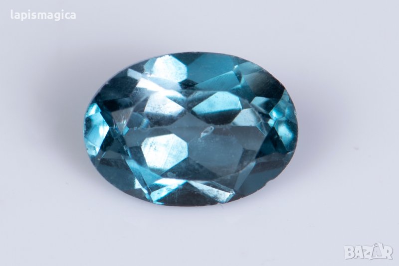 Топаз лондонско синьо 0.93ct 7x5mm овална шлифовка #6, снимка 1