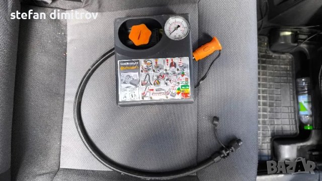 Компресор Continenatal  за помпане на гуми с букса за автомобилна запалка.

