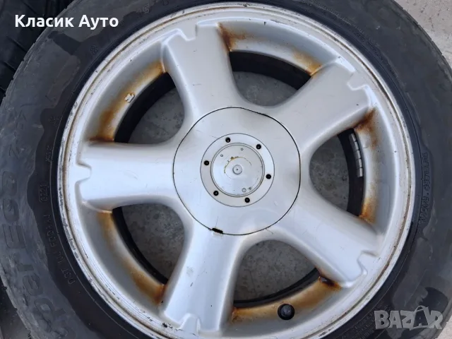 Алуминиеви джанти Nissan 15-цола, снимка 4 - Гуми и джанти - 55585865