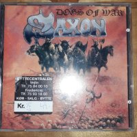 Компакт диск на хеви металягите  - Saxon –Dogs Of War 1995, снимка 1 - CD дискове - 41663250