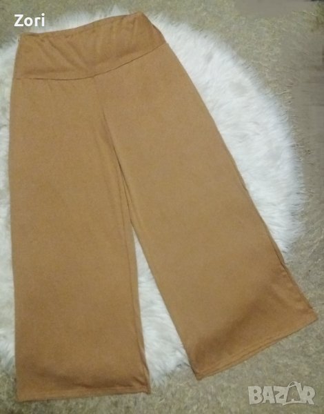 УНИКАЛЕН Светлобежов панталон с широк крачол и широк ластик в талията , снимка 1