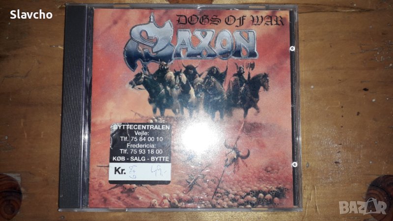 Компакт диск на хеви металягите  - Saxon –Dogs Of War 1995, снимка 1
