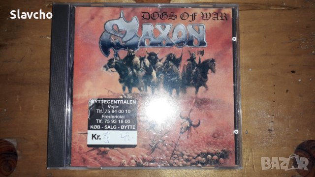 Компакт диск на хеви металягите  - Saxon –Dogs Of War 1995