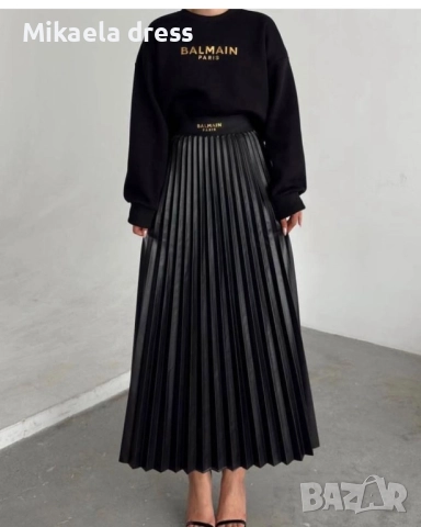 Прекрасен есенен сет на бранда Balmain, включващ черна пола солей и суичър кроп. Идеален за стилни и, снимка 1