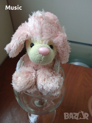 Малко плюшено кученце пуделче