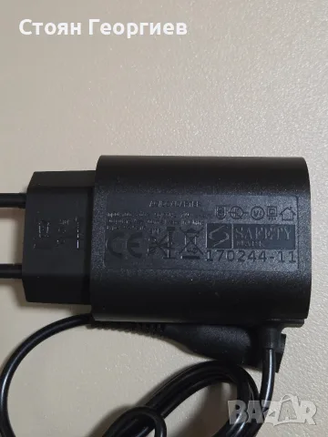 Чисто нов захранващ адаптер (зарядно устройство) с изходно напрежение 12V,