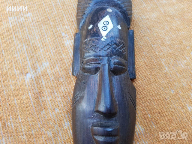 Маска от абаносово дърво 