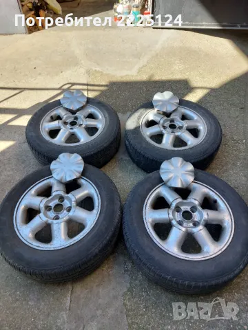 Продавам 4 броя оригинални  алуминиеви джанти с гуми 15 цола за Рено Сценик, снимка 2 - Гуми и джанти - 49402049