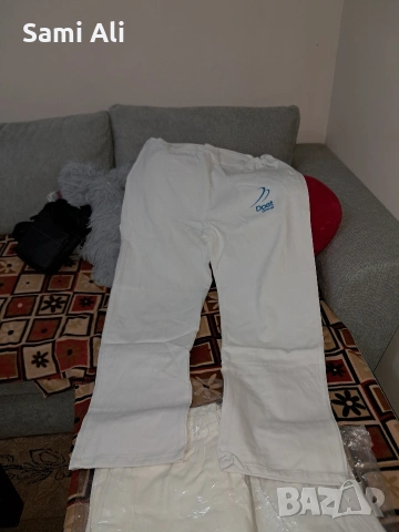 Продавам 500 чисто нови работни панталони в бял цвят. Панталоните са в, снимка 2 - Панталони - 53835448