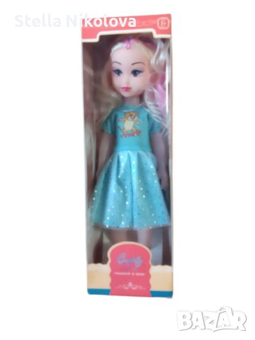 Музикална детска кукла с розов кичур и синя рокличка