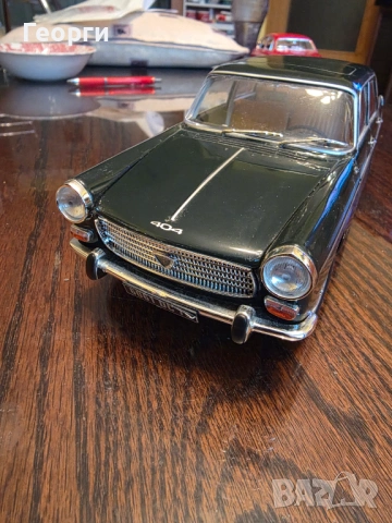 Peugeot 404 1/18 Norev
